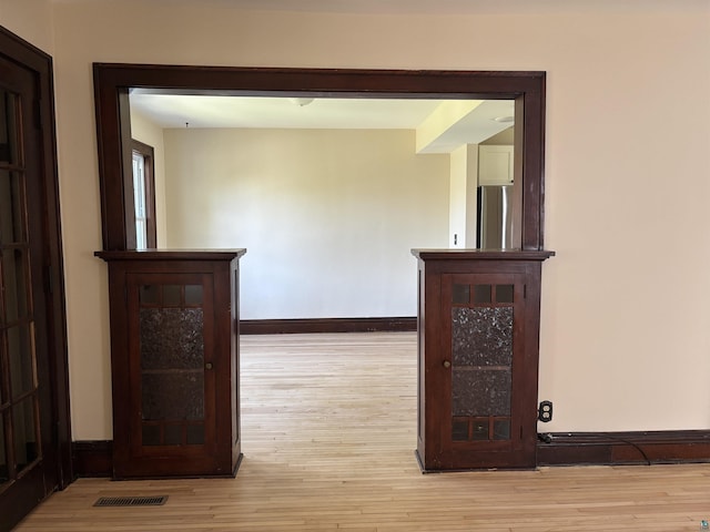 620 N 40th Ave W, Duluth, MN 55807 - corridor featuring wood finished floors and baseboards