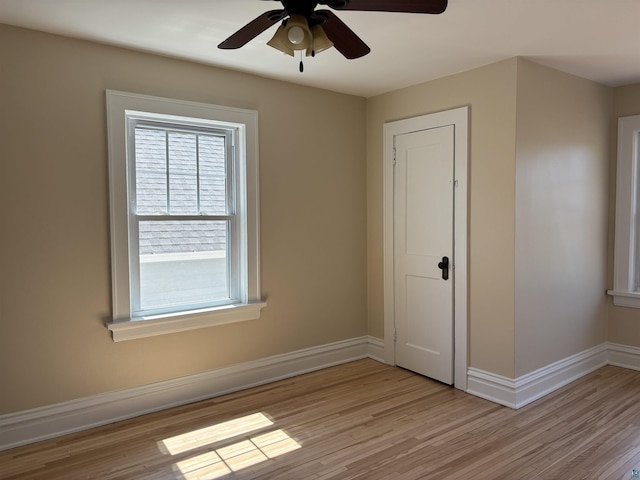 620 N 40th Ave W, Duluth, MN 55807 - spare room featuring light wood-style flooring, baseboards, and ceiling fan