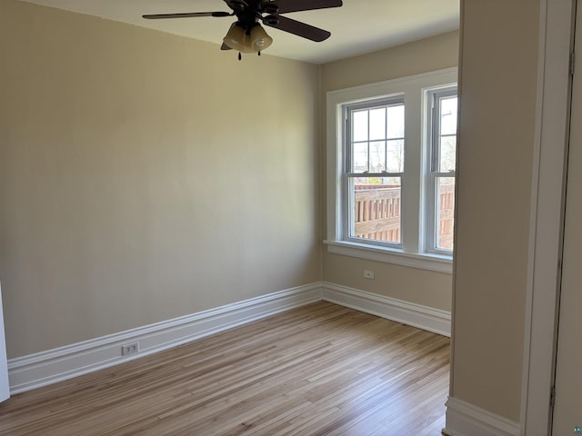 620 N 40th Ave W, Duluth, MN 55807 - empty room with light wood-style floors, ceiling fan, and baseboards