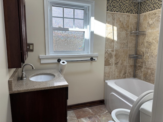620 N 40th Ave W, Duluth, MN 55807 - full bath with toilet, vanity, healthy amount of natural light, and baseboards