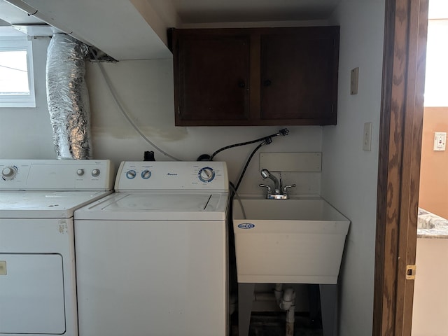 620 N 40th Ave W, Duluth, MN 55807 - washroom with cabinet space and separate washer and dryer
