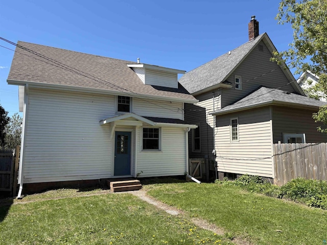 620 N 40th Ave W, Duluth, MN 55807 - back of property featuring entry steps and roof with shingles