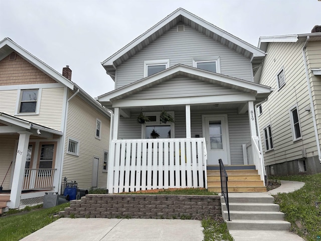 819 N 10th Ave E, Duluth, MN 55805 - view of front of house with a porch