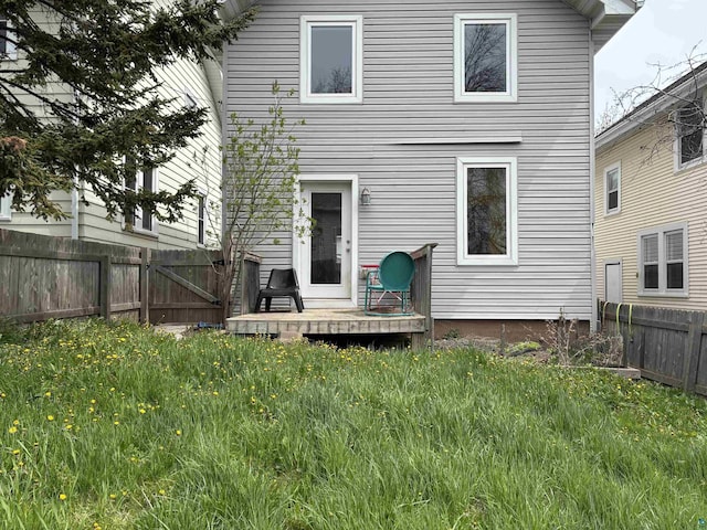 819 N 10th Ave E, Duluth, MN 55805 - rear view of property featuring a deck