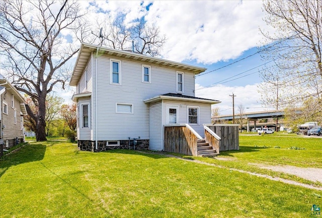 26 N 59th Ave W, Duluth, MN 55807 - rear view of house featuring a lawn