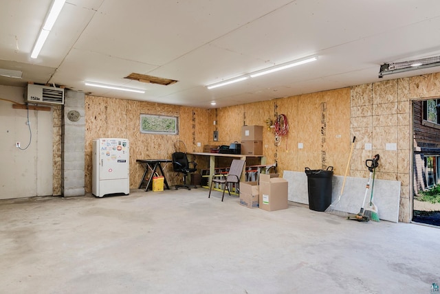 4527 Vermilion Trl, Gilbert, MN 55741 - garage featuring a heating unit and a workshop area