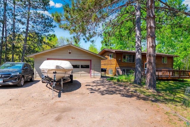4527 Vermilion Trl, Gilbert, MN 55741 - view of front of home featuring a garage and an outbuilding