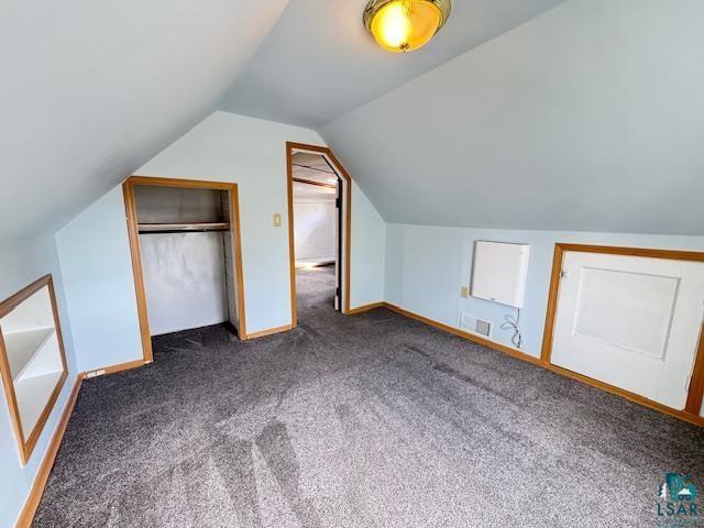 1917 Greysolon Rd, Duluth, MN 55812 - bonus room with carpet, vaulted ceiling, and baseboards