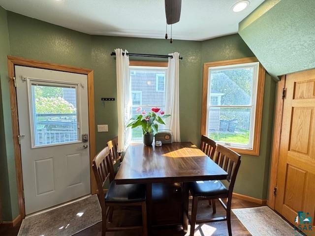 1917 Greysolon Rd, Duluth, MN 55812 - dining space featuring baseboards, wood finished floors, and a ceiling fan