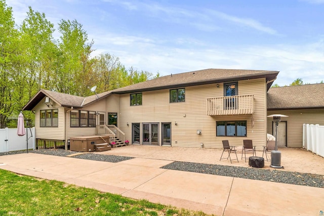 4976 Maribe Dr, Hermantown, MN 55811 - back of property featuring a patio and a balcony