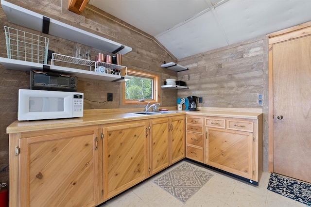 9320 W Branch Rd, Duluth, MN 55803 - kitchen featuring white microwave, open shelves, lofted ceiling, a sink, and light countertops