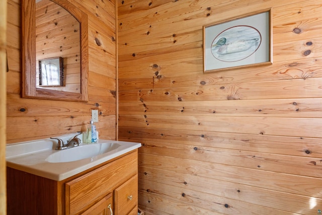 9320 W Branch Rd, Duluth, MN 55803 - bathroom featuring vanity and wood walls