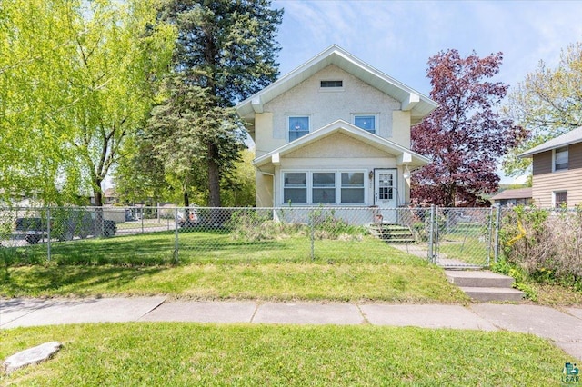 997 85th Ave W, Duluth, MN 55808 - american foursquare style home featuring a gate and stucco siding