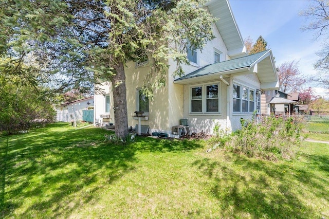 997 85th Ave W, Duluth, MN 55808 - view of home's exterior with stucco siding