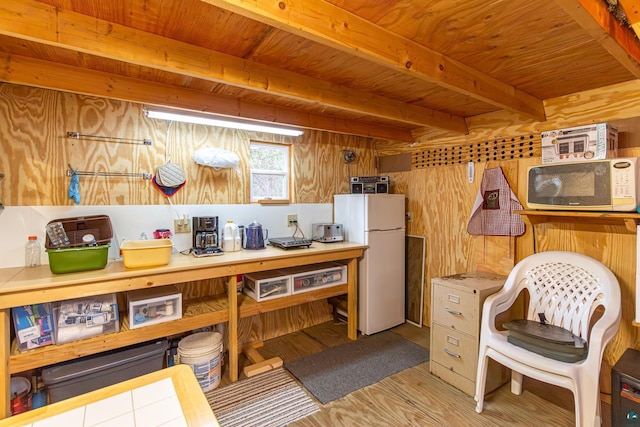 2260 Goldmine Rd, Ely, MN 55731 - kitchen with white appliances, wooden ceiling with exposed beams, wood finished floors, and wooden walls