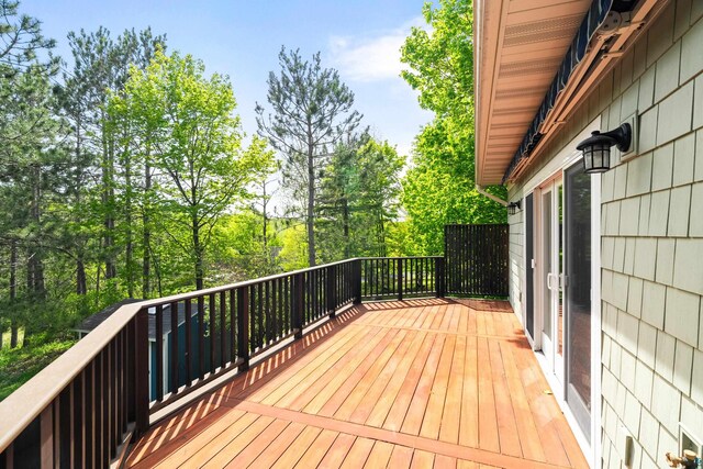 596 W Wabasha St, Duluth, MN 55803 - wooden deck with view of scattered trees