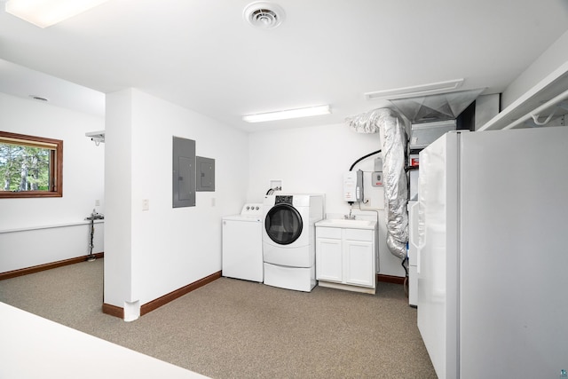596 W Wabasha St, Duluth, MN 55803 - laundry area with washing machine and dryer, cabinet space, electric panel, and carpet
