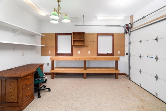 596 W Wabasha St, Duluth, MN 55803 - garage with a workshop area and baseboards