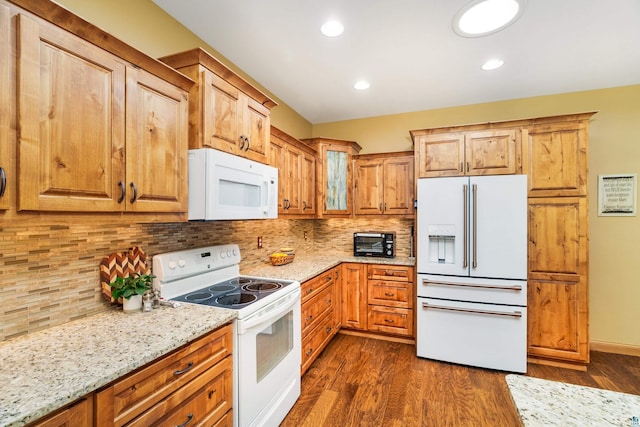 5036 Silver Leaf St, Hermantown, MN 55811 - kitchen with white appliances, dark wood-style flooring, light stone countertops, tasteful backsplash, and recessed lighting