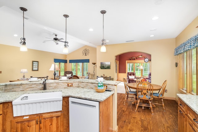 5036 Silver Leaf St, Hermantown, MN 55811 - kitchen with white dishwasher, brown cabinets, a sink, lofted ceiling, and dark wood-style floors