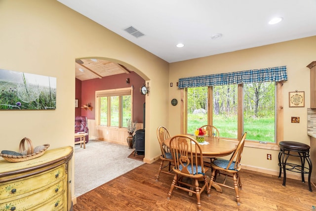 5036 Silver Leaf St, Hermantown, MN 55811 - dining space with arched walkways, wood finished floors, healthy amount of natural light, recessed lighting, and baseboards