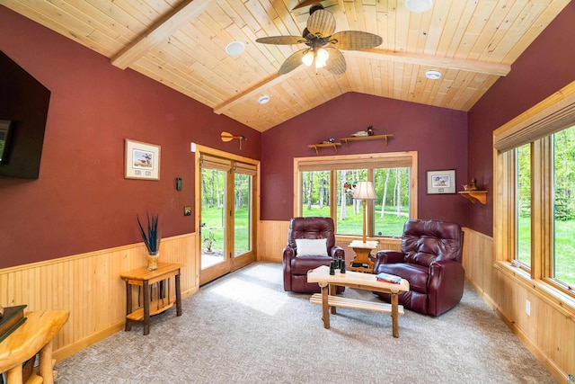 5036 Silver Leaf St, Hermantown, MN 55811 - carpeted living room with wainscoting, healthy amount of natural light, wood ceiling, a ceiling fan, and wood walls