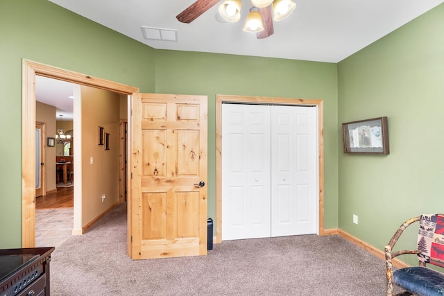 5036 Silver Leaf St, Hermantown, MN 55811 - bedroom with carpet floors, a closet, baseboards, and a ceiling fan