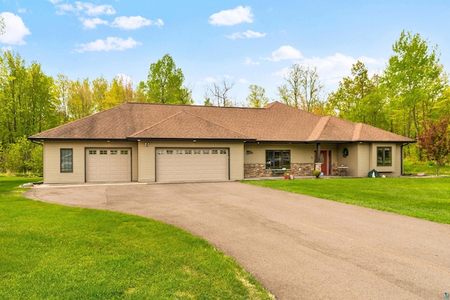 5036 Silver Leaf St, Hermantown, MN 55811 - view of front of house with asphalt driveway, an attached garage, a front lawn, and a shingled roof
