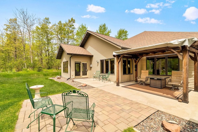 5036 Silver Leaf St, Hermantown, MN 55811 - back of property featuring a patio area, a yard, roof with shingles, and outdoor dining area