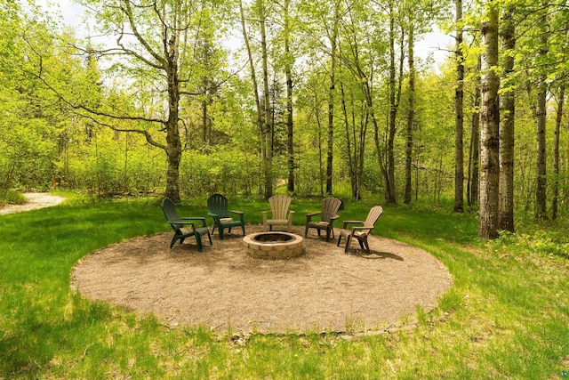 5036 Silver Leaf St, Hermantown, MN 55811 - surrounding community with an outdoor fire pit and a lawn