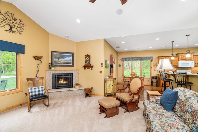 5036 Silver Leaf St, Hermantown, MN 55811 - carpeted living area featuring recessed lighting, baseboards, a fireplace, arched walkways, and vaulted ceiling