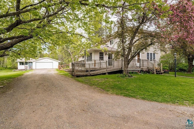 13107 W 9th St, Duluth, MN 55808 - view of front of home featuring an outdoor structure, a wooden deck, a front lawn, and driveway