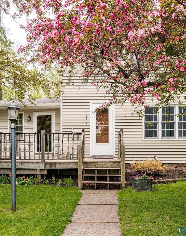 13107 W 9th St, Duluth, MN 55808 - property entrance with a wooden deck and a yard