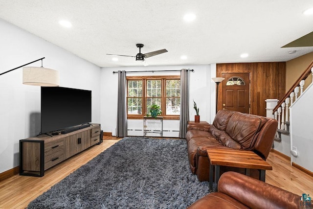 13107 W 9th St, Duluth, MN 55808 - living room featuring ceiling fan, recessed lighting, light wood-type flooring, stairway, and baseboards