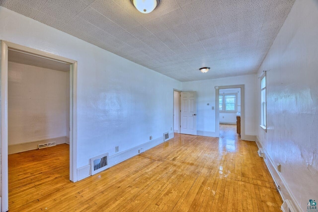 4191 Kerr Location, Hibbing, MN 55746 - spare room with light wood-style floors