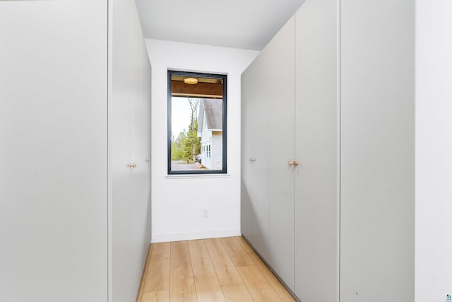 2413 Lismore Rd, Duluth, MN 55804 - hall featuring light wood finished floors and baseboards