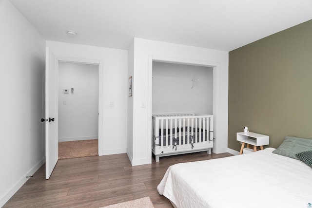 2413 Lismore Rd, Duluth, MN 55804 - bedroom featuring wood finished floors and baseboards