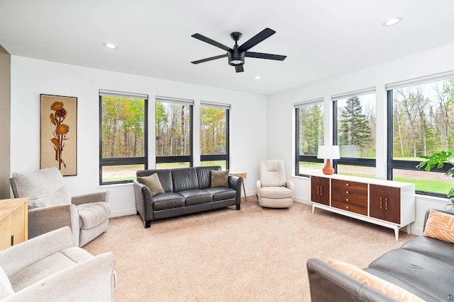 2413 Lismore Rd, Duluth, MN 55804 - carpeted living room with healthy amount of natural light, recessed lighting, baseboards, and a ceiling fan