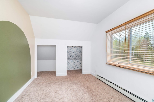 2413 Lismore Rd, Duluth, MN 55804 - unfurnished bedroom featuring a baseboard radiator, carpet floors, and baseboards