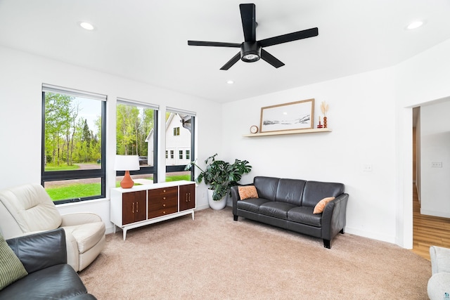 2413 Lismore Rd, Duluth, MN 55804 - living room featuring light carpet, recessed lighting, ceiling fan, and baseboards