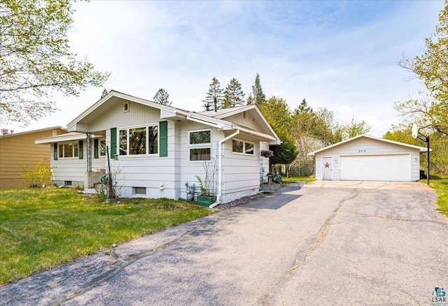 2715 Triggs Ave, Duluth, MN 55811 - ranch-style home featuring an outdoor structure, a garage, and a front lawn