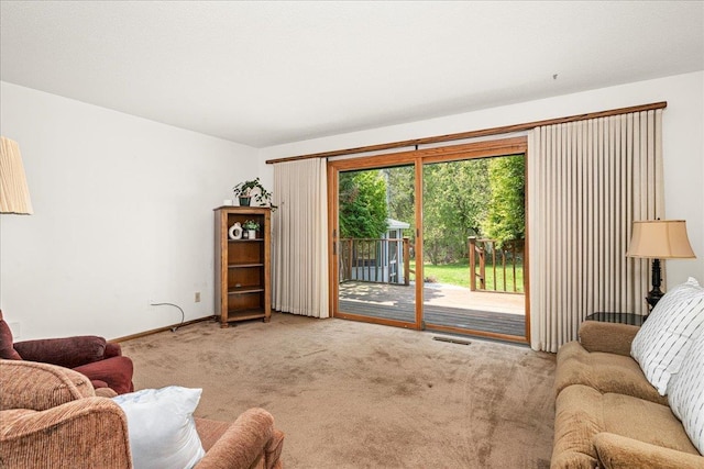 2715 Triggs Ave, Duluth, MN 55811 - carpeted living room with baseboards