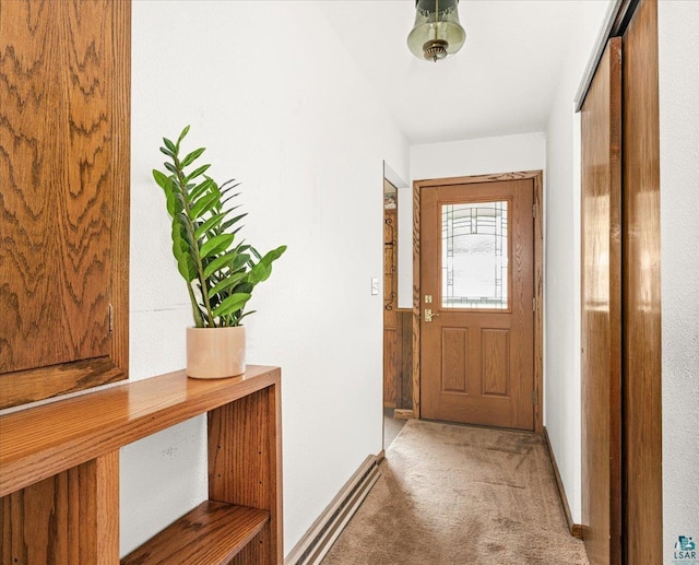 2715 Triggs Ave, Duluth, MN 55811 - doorway to outside with light carpet and baseboards