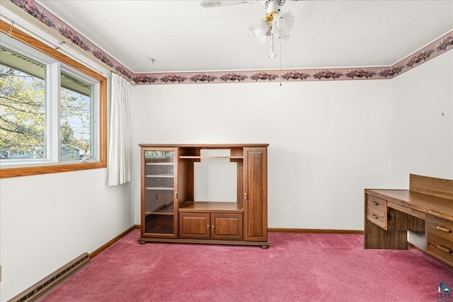 2715 Triggs Ave, Duluth, MN 55811 - unfurnished bedroom featuring carpet flooring, a baseboard heating unit, and baseboards