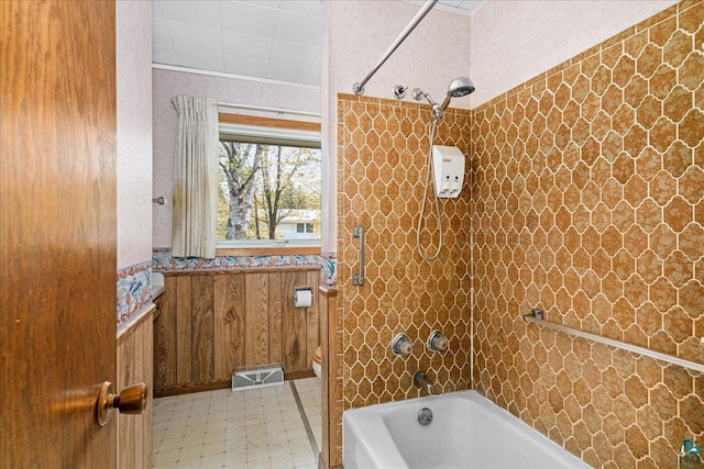 2715 Triggs Ave, Duluth, MN 55811 - full bath featuring tile patterned floors, bathtub / shower combination, and toilet