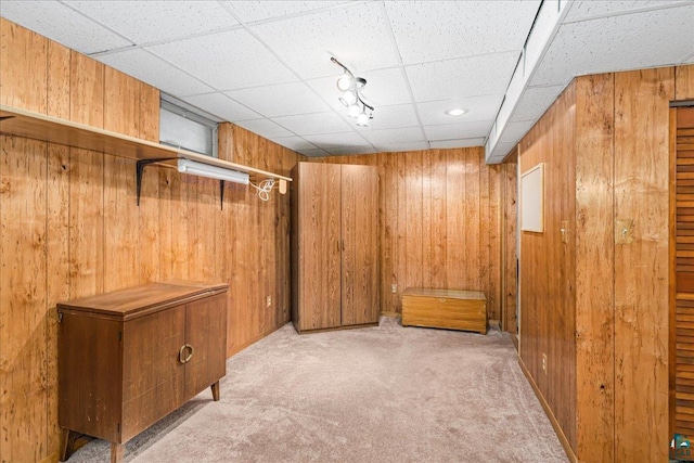 2715 Triggs Ave, Duluth, MN 55811 - finished basement featuring carpet flooring, wood walls, and a drop ceiling