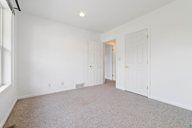 601 N 22nd Ave W, Duluth, MN 55806 - carpeted spare room with baseboards and recessed lighting