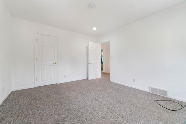 601 N 22nd Ave W, Duluth, MN 55806 - spare room with carpet floors, baseboards, recessed lighting, and a smoke detector