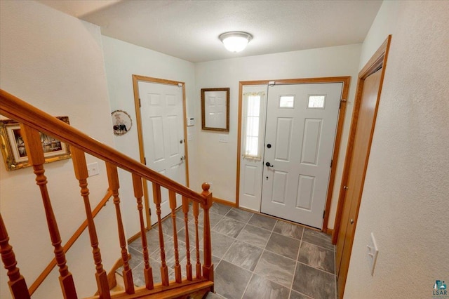 1505 Coachlight Crk, Proctor, MN 55810 - foyer featuring stairway and baseboards