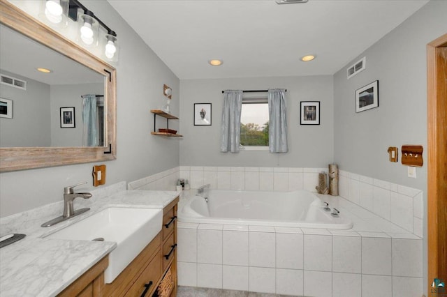 1505 Coachlight Crk, Proctor, MN 55810 - bathroom featuring vanity, a bath, and recessed lighting